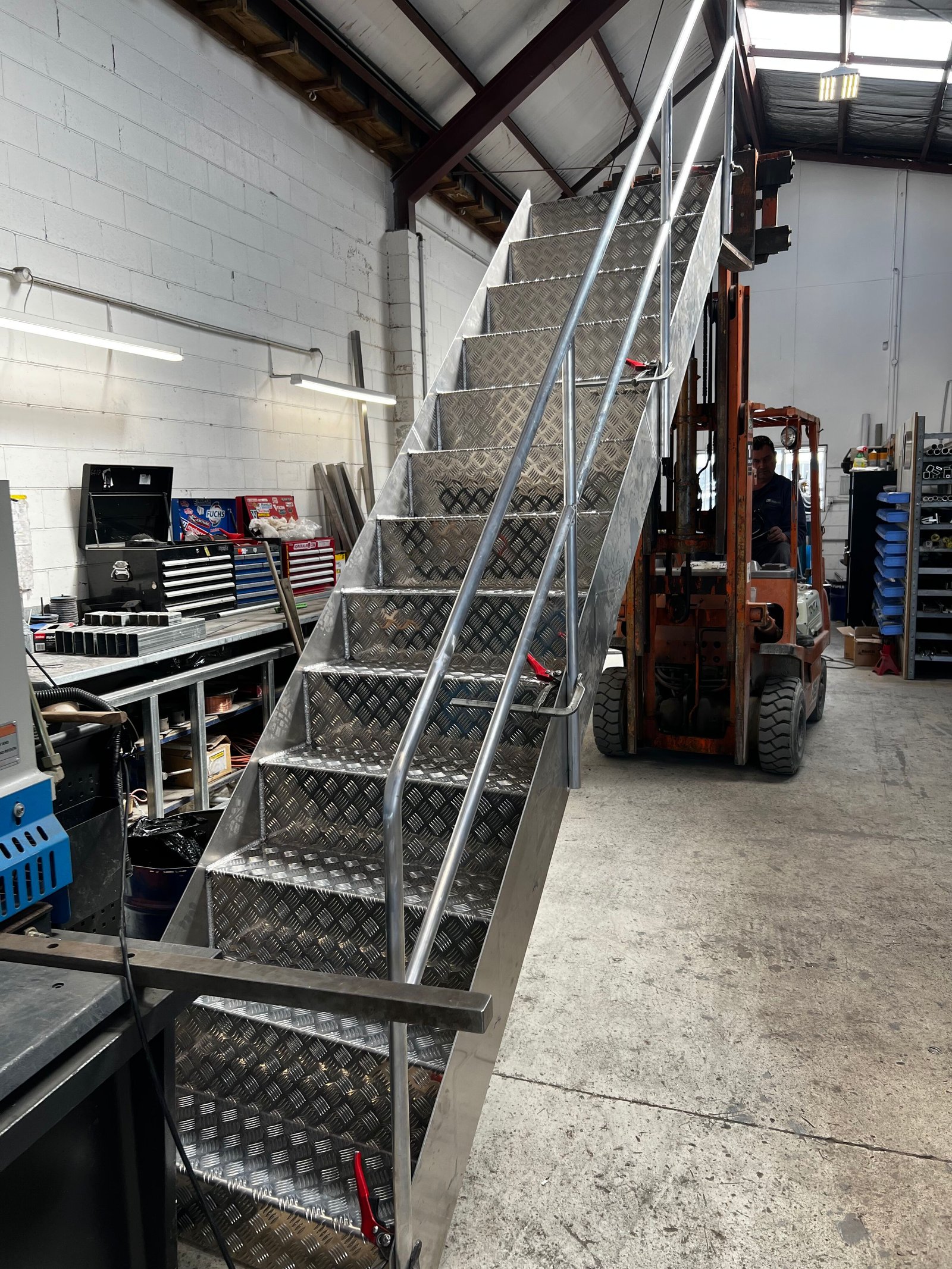 Custom fabricated aluminium stair assembly in the Bays Engineering workshop